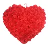 Heart shaped pillow with rosesCushions