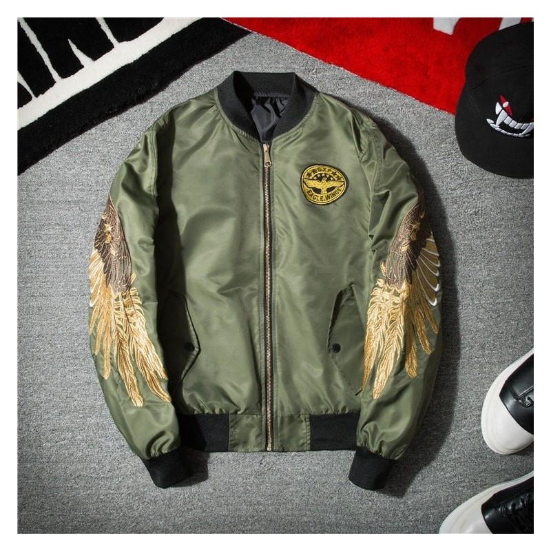 Black bomber jacket with embroidered golden wingsJackets
