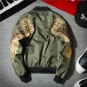 Black bomber jacket with embroidered golden wingsJackets
