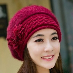Knitted beret - a warm fur hat with decorative flowers