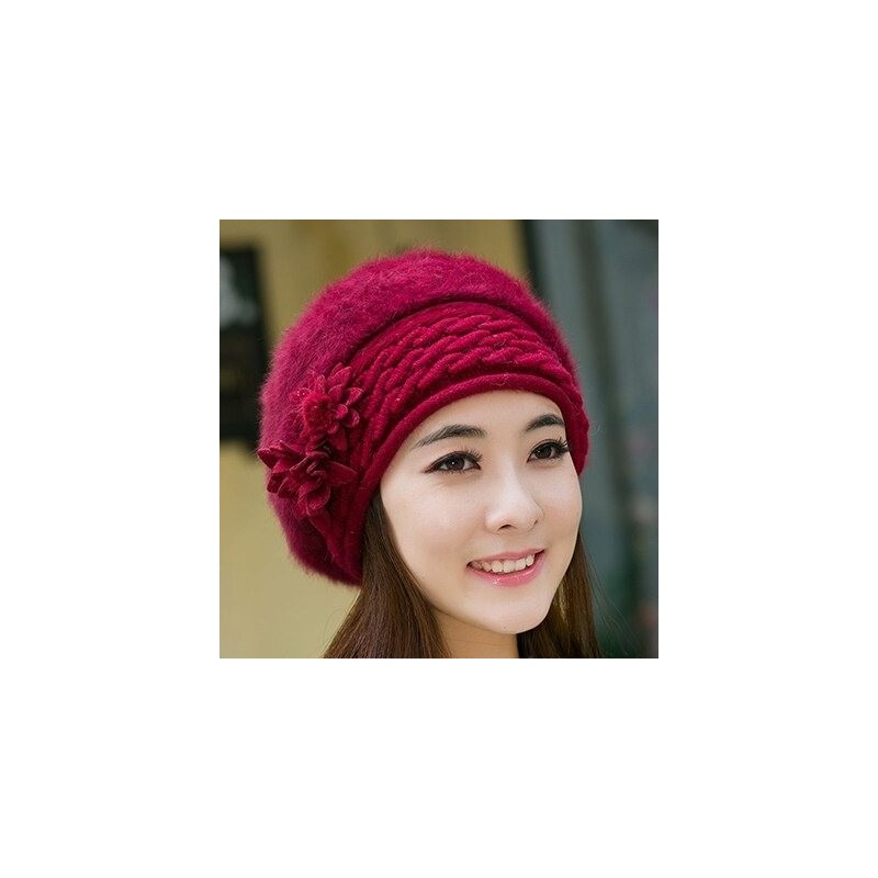 Knitted beret - a warm fur hat with decorative flowers