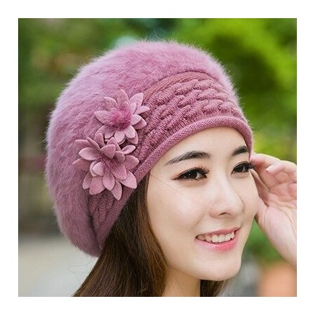 Knitted beret - a warm fur hat with decorative flowers
