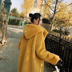 Fashionable fur coat with hoodie