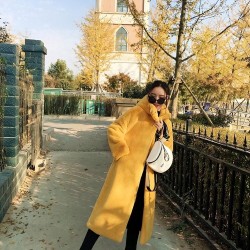 Fashionable fur coat with hoodie