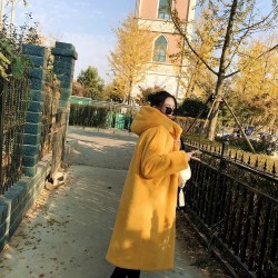 Fashionable fur coat with hoodie