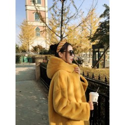 Fashionable fur coat with hoodie