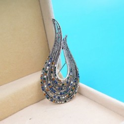 U-shaped brooch - with crystal decorations