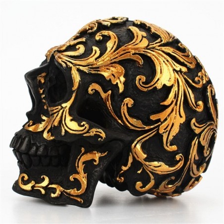 Black skull head - with golden carvings - resin statue