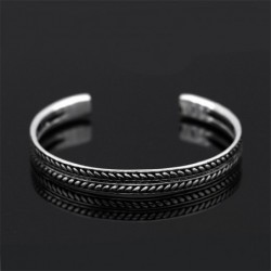 Stainless steel bracelet - with leaf pattern - open design - unisex