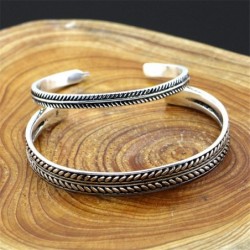 Stainless steel bracelet - with leaf pattern - open design - unisex