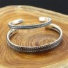 Stainless steel bracelet - with leaf pattern - open design - unisex