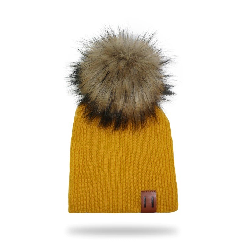 Knitted beanie with pom pom / leather label - unisex - for kids / adults
