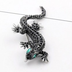 Vintage brooch with crystal lizard