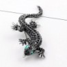Vintage brooch with crystal lizard