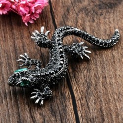 Vintage brooch with crystal lizard