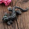 Vintage brooch with crystal lizard