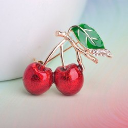 Elegant brooch with a red crystal cherry