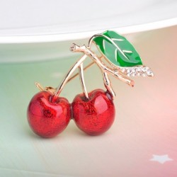 Elegant brooch with a red crystal cherry