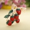 Elegant brooch with a sprig of strawberriesBrooches