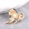 Vintage bird-shaped brooch with pearl
