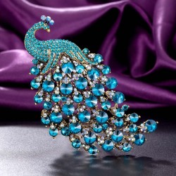 Luxurious brooch with large crystal peacock