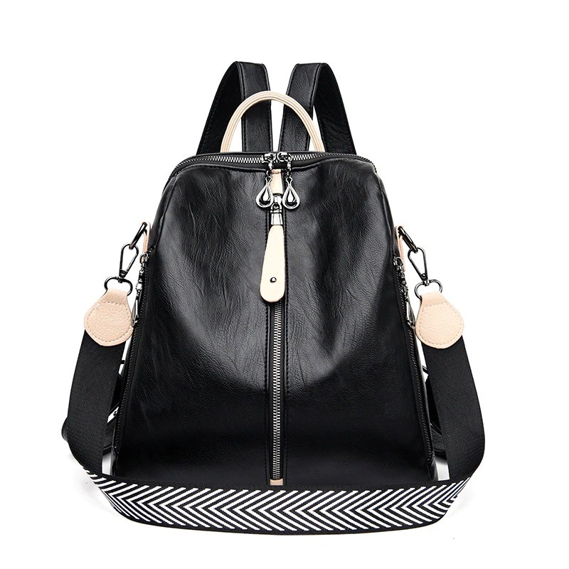 Multifunctional backpack - leather shoulder bag - with zippers