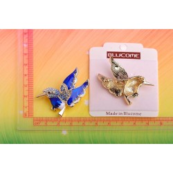 Elegant brooch - with green crystal bird