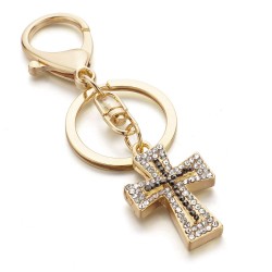 Porta-chaves com uma cruz de cristal