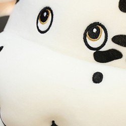 Brinquedo de pelúcia em forma de vaca dos desenhos animados