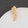 Retro golden brooch - asymmetric abstractBrooches
