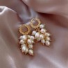 Brincos de ouro elegantes - com pérolas de várias camadas