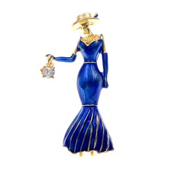 Broche da moda - uma mulher de vestido azul com uma bolsa de cristal