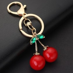 Chaveiro vermelho em forma de cereja - com cristal verde