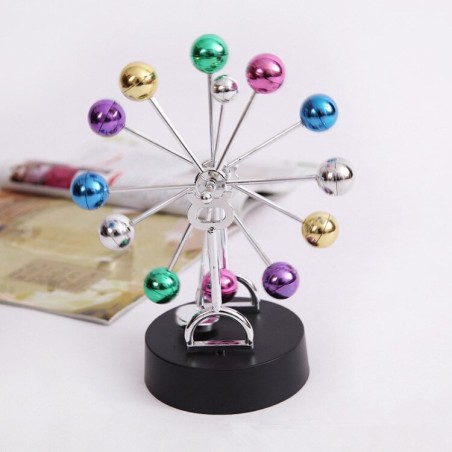 Roda gigante giratória colorida - bola de pêndulo de Newton