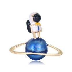 Broche elegante com astronauta / globo