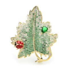 Luxuoso broche de cristal - besouro vermelho / folha verde