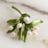 Ramo de oliveira com pérolas - broche elegante