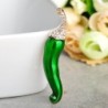 Broche de cristal - com pimenta verde e vermelha