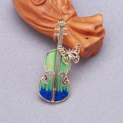 Broche elegante com guitarra e borboleta de cristal
