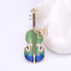 Broche elegante com guitarra e borboleta de cristal