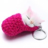 Sleeping cat in a hand-woven cot - keychainKeyrings