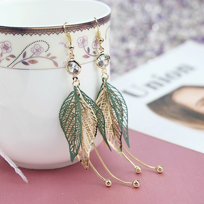 Hollow leafs long earrings - with zircon / pearlsEarrings
