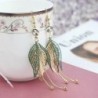 Hollow leafs long earrings - with zircon / pearlsEarrings