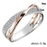 Elegant women's ring - two-tones - X-shape - white zirconiaRings