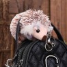 Chaveiro ouriço - pom pom de pelúcia