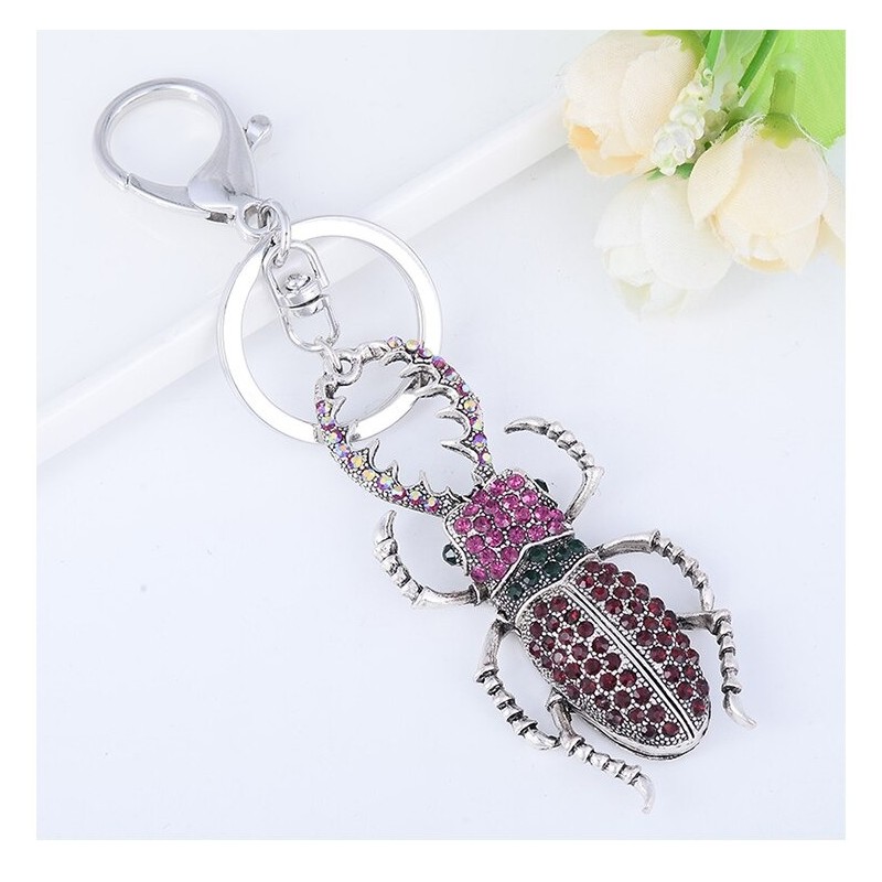 chaveiro em forma de inseto de cristal