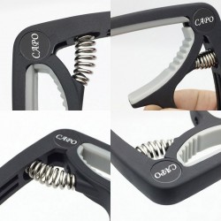 Plastic guitar capo - for 6-string instrumentGuitars