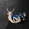 Caracol de esmalte / cristal - broche