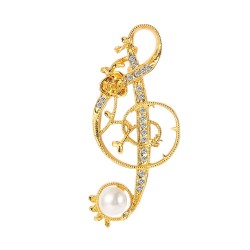 Nota musical em cristal dourado com pérola - broche