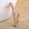 Saxofone de cristal dourado - broche